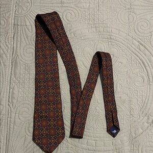 Burberry Geometric Patterned Tie in Burgundy & Gold seam separation half neck